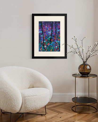Black framed A3 twilight floral painting on a pale grey wall above a white bouclé chair and brass side table with blossom in a smoke orb.