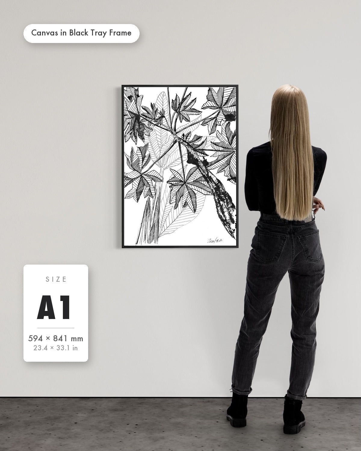 Andrea Nicole 'Banana Grove' fine art canvas in a black tray float frame, A1 — shown to scale on a gallery wall with a size guide card. | an:family=canvas;role=sizeref;size=A1;finish=black