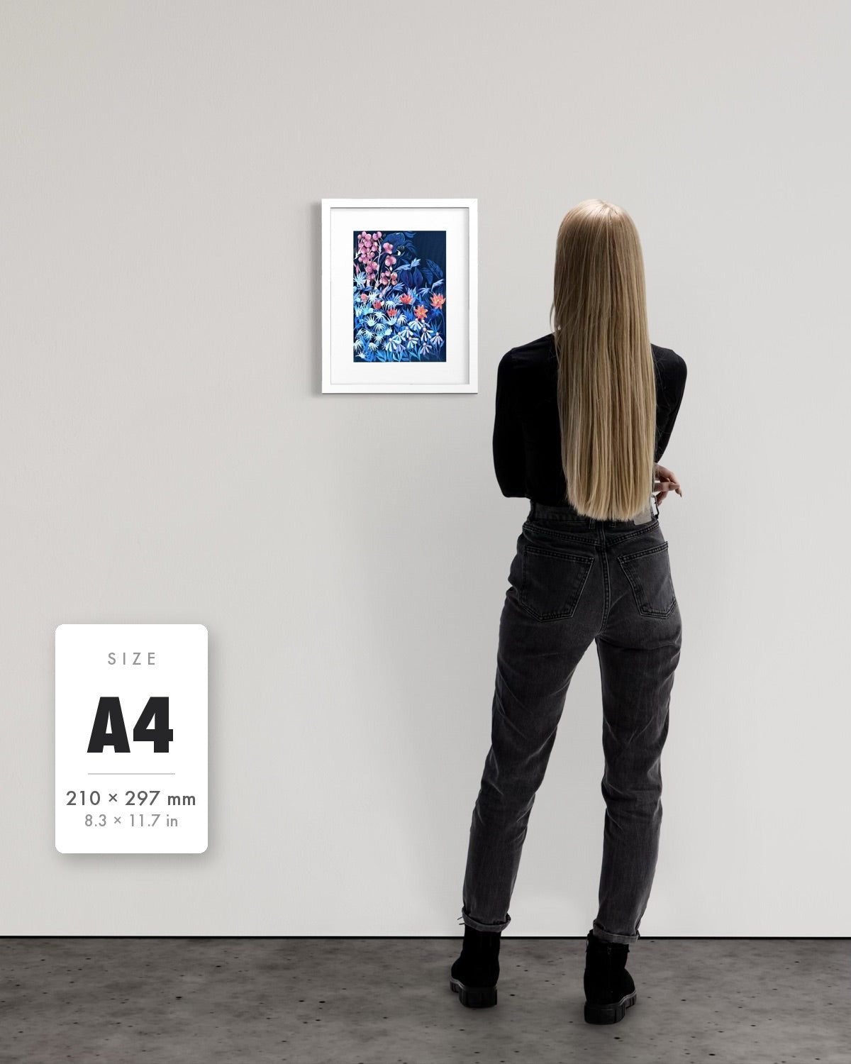 Emerging Through Fear — A4 (210 x 297 mm) white frame art print shown to scale beside a person, with a size guide card. | an:family=print;role=sizeref;size=A4;finish=white