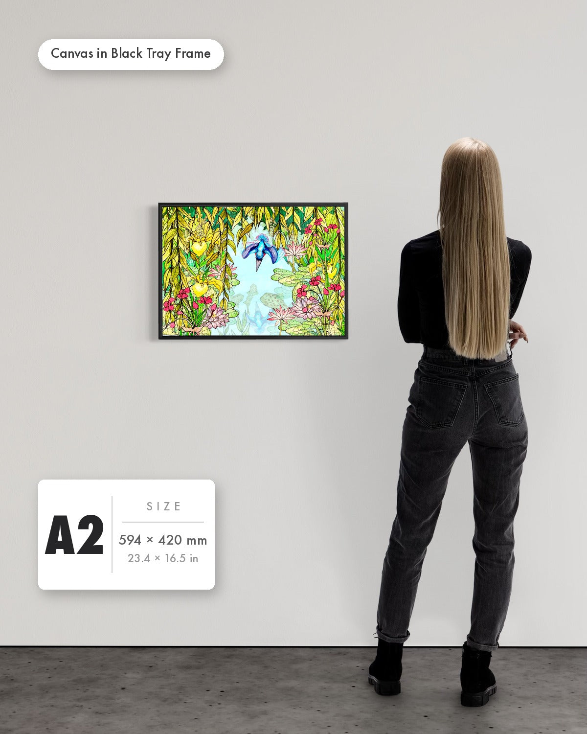 Andrea Nicole 'Halcyon River' fine art canvas in a black tray float frame, A2 — shown to scale on a gallery wall with a size guide card. | an:family=canvas;role=sizeref;size=A2;finish=black