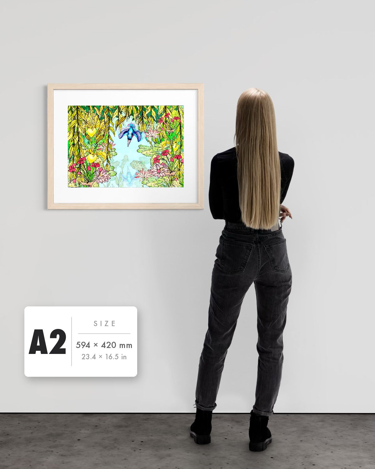 Halcyon River — A2 (594 x 420 mm) natural frame art print shown to scale beside a person, with a size guide card. | an:family=print;role=sizeref;size=A2;finish=natural
