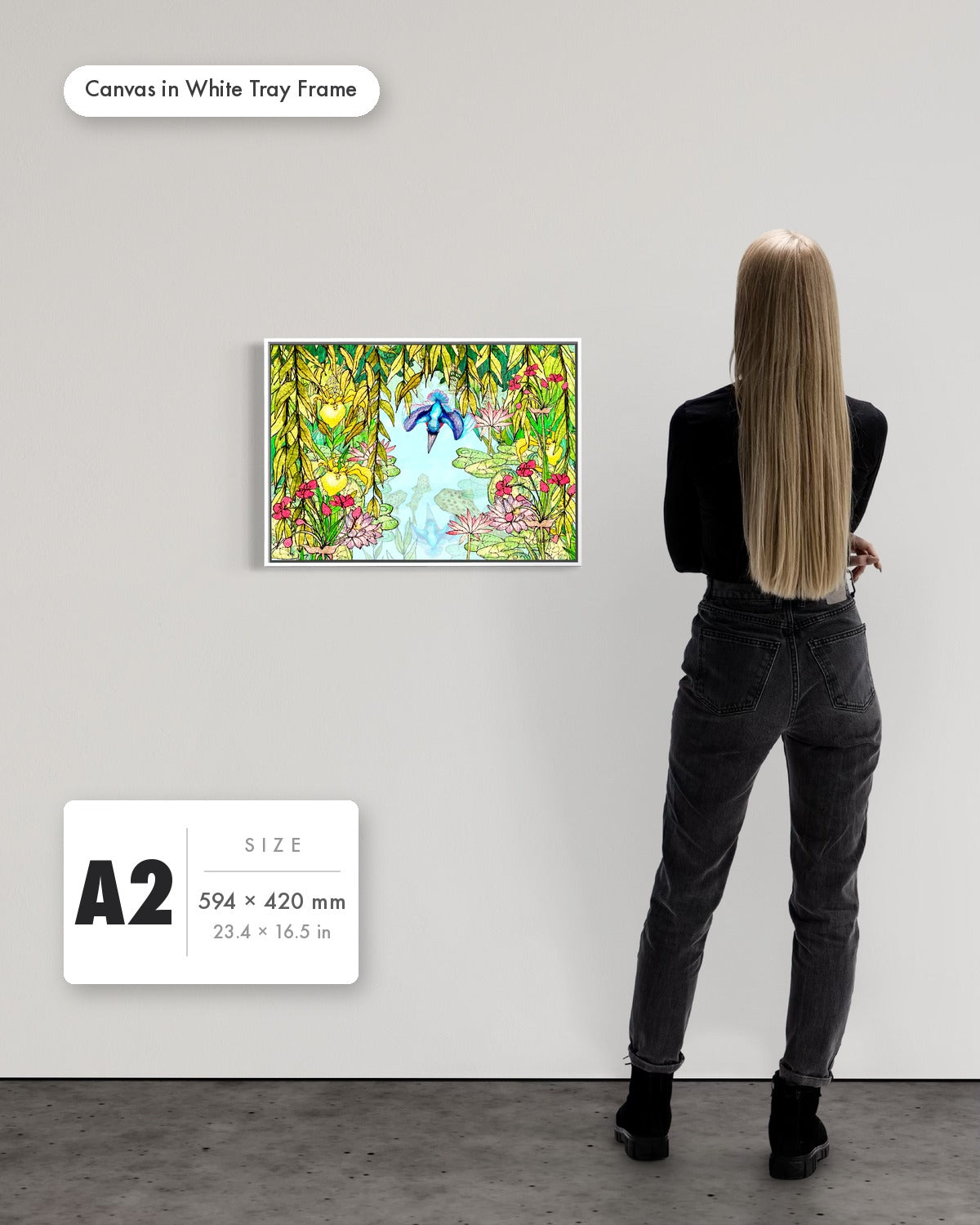 Andrea Nicole 'Halcyon River' fine art canvas in a white tray float frame, A2 — shown to scale on a gallery wall with a size guide card. | an:family=canvas;role=sizeref;size=A2;finish=white