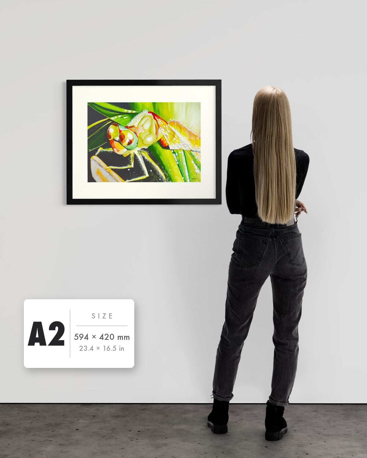 Just For a Moment — A2 (594 x 420 mm) black frame art print shown to scale beside a person, with a size guide card. | an:family=print;role=sizeref;size=A2;finish=black