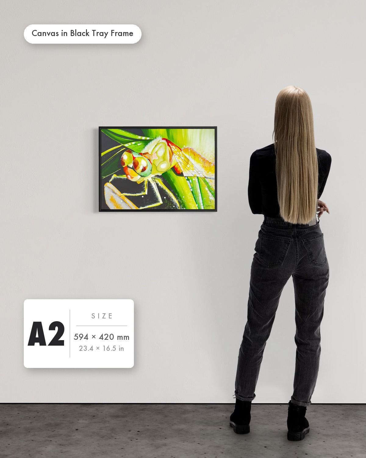 Andrea Nicole 'Just For a Moment' fine art canvas in a black tray float frame, A2 — shown to scale on a gallery wall with a size guide card. | an:family=canvas;role=sizeref;size=A2;finish=black