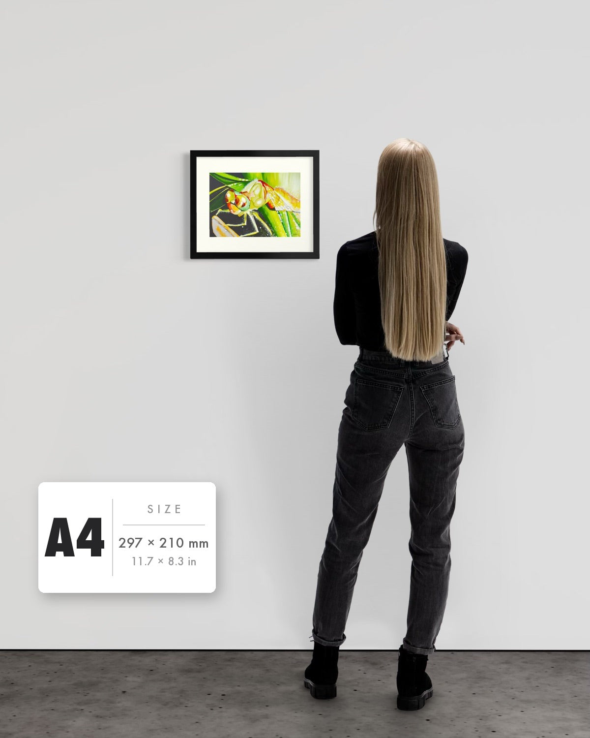 Just For a Moment — A4 (297 x 210 mm) black frame art print shown to scale beside a person, with a size guide card. | an:family=print;role=sizeref;size=A4;finish=black