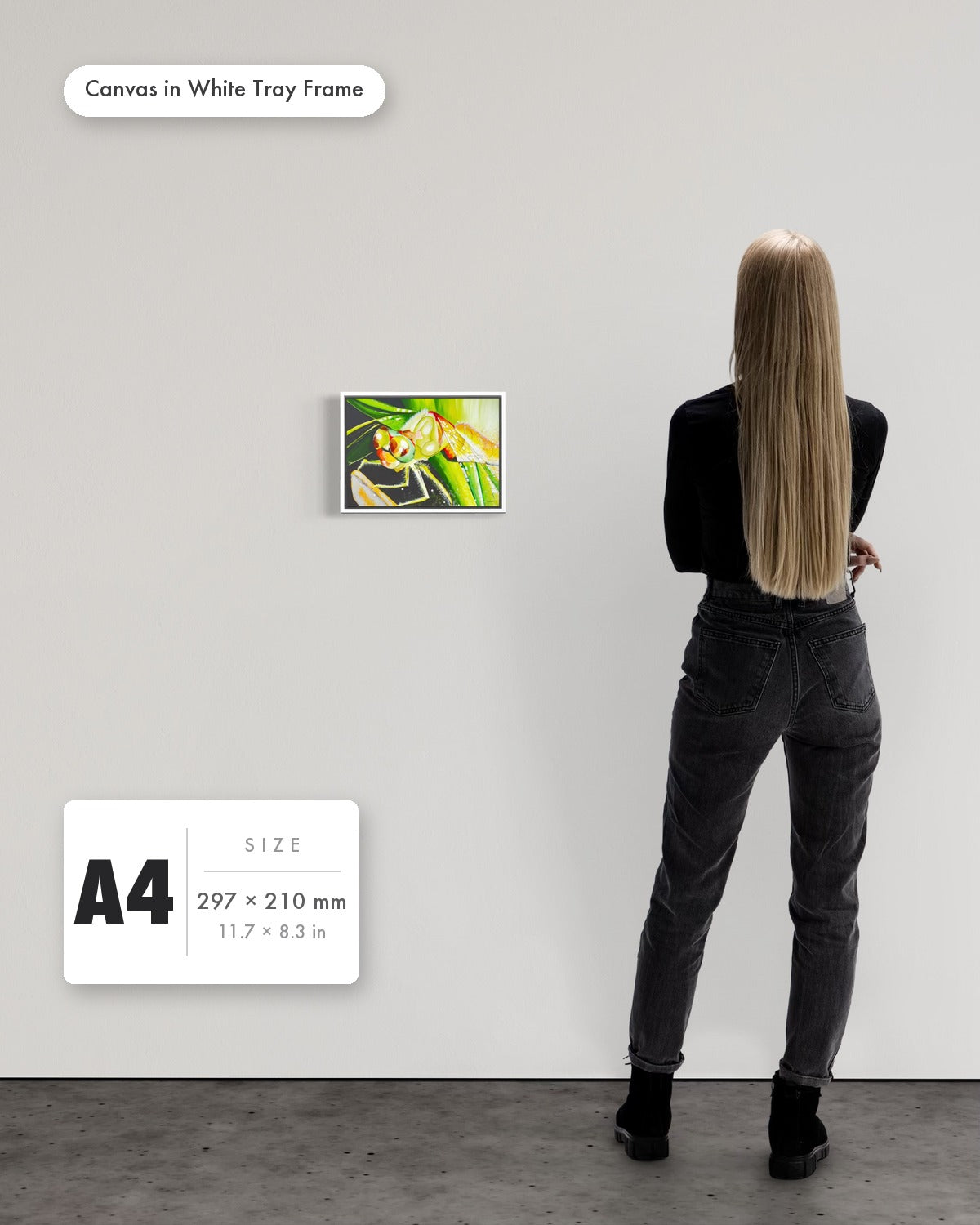 Andrea Nicole 'Just For a Moment' fine art canvas in a white tray float frame, A4 — shown to scale on a gallery wall with a size guide card. | an:family=canvas;role=sizeref;size=A4;finish=white