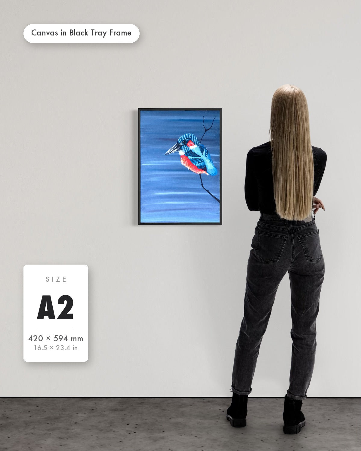 Andrea Nicole 'Patience' fine art canvas in a black tray float frame, A2 — shown to scale on a gallery wall with a size guide card. | an:family=canvas;role=sizeref;size=A2;finish=black