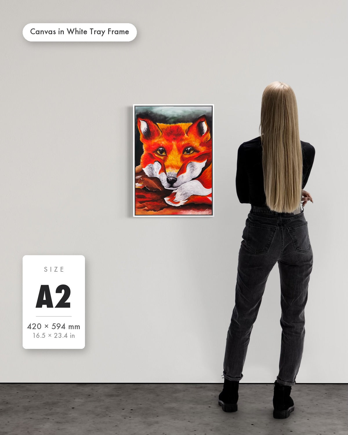 Andrea Nicole 'Quiet Curiosity' fine art canvas in a white tray float frame, A2 — shown to scale on a gallery wall with a size guide card. | an:family=canvas;role=sizeref;size=A2;finish=white