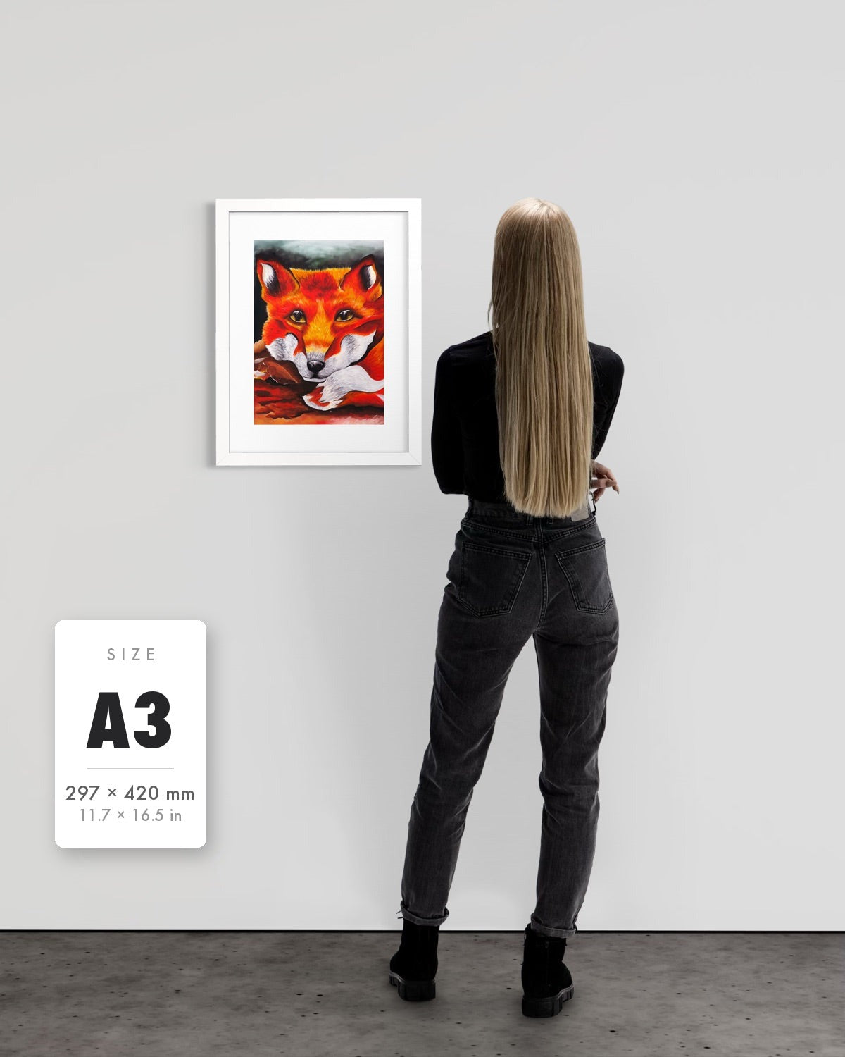 Quiet Curiosity — A3 (297 x 420 mm) white frame art print shown to scale beside a person, with a size guide card. | an:family=print;role=sizeref;size=A3;finish=white