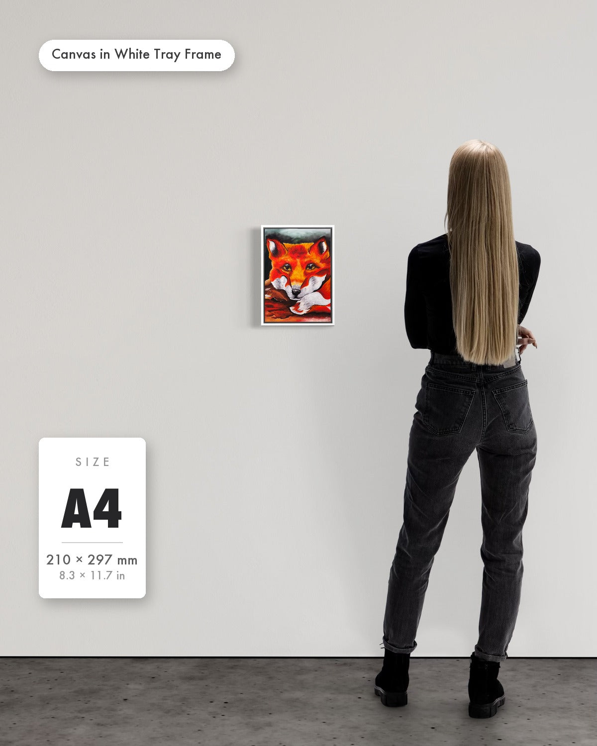 Andrea Nicole 'Quiet Curiosity' fine art canvas in a white tray float frame, A4 — shown to scale on a gallery wall with a size guide card. | an:family=canvas;role=sizeref;size=A4;finish=white