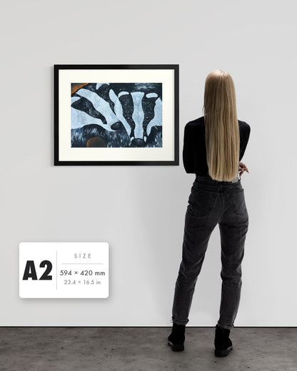 Secret Whispers — A2 (594 x 420 mm) black frame art print shown to scale beside a person, with a size guide card. | an:family=print;role=sizeref;size=A2;finish=black