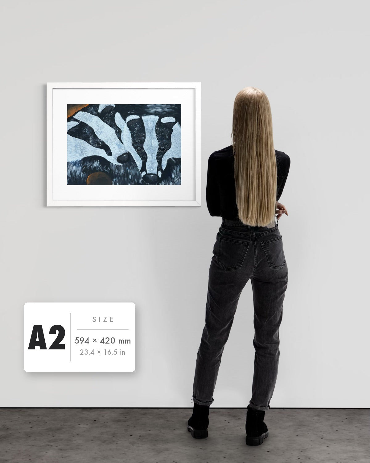 Secret Whispers — A2 (594 x 420 mm) white frame art print shown to scale beside a person, with a size guide card. | an:family=print;role=sizeref;size=A2;finish=white
