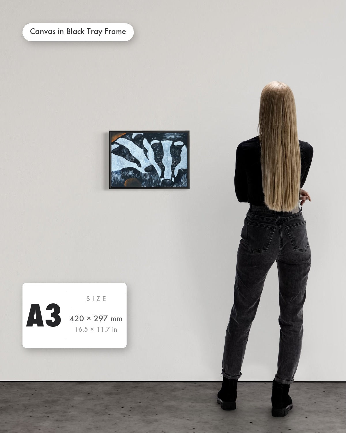 Andrea Nicole 'Secret Whispers' fine art canvas in a black tray float frame, A3 — shown to scale on a gallery wall with a size guide card. | an:family=canvas;role=sizeref;size=A3;finish=black