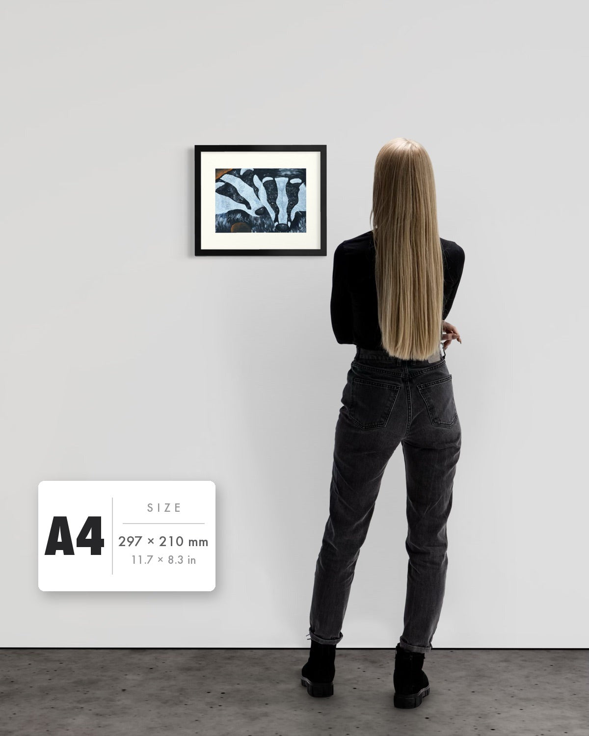 Secret Whispers — A4 (297 x 210 mm) black frame art print shown to scale beside a person, with a size guide card. | an:family=print;role=sizeref;size=A4;finish=black