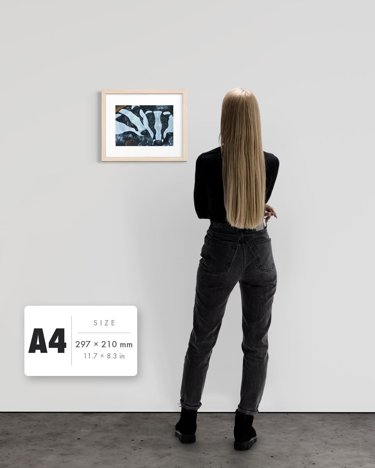 Secret Whispers — A4 (297 x 210 mm) natural frame art print shown to scale beside a person, with a size guide card. | an:family=print;role=sizeref;size=A4;finish=natural