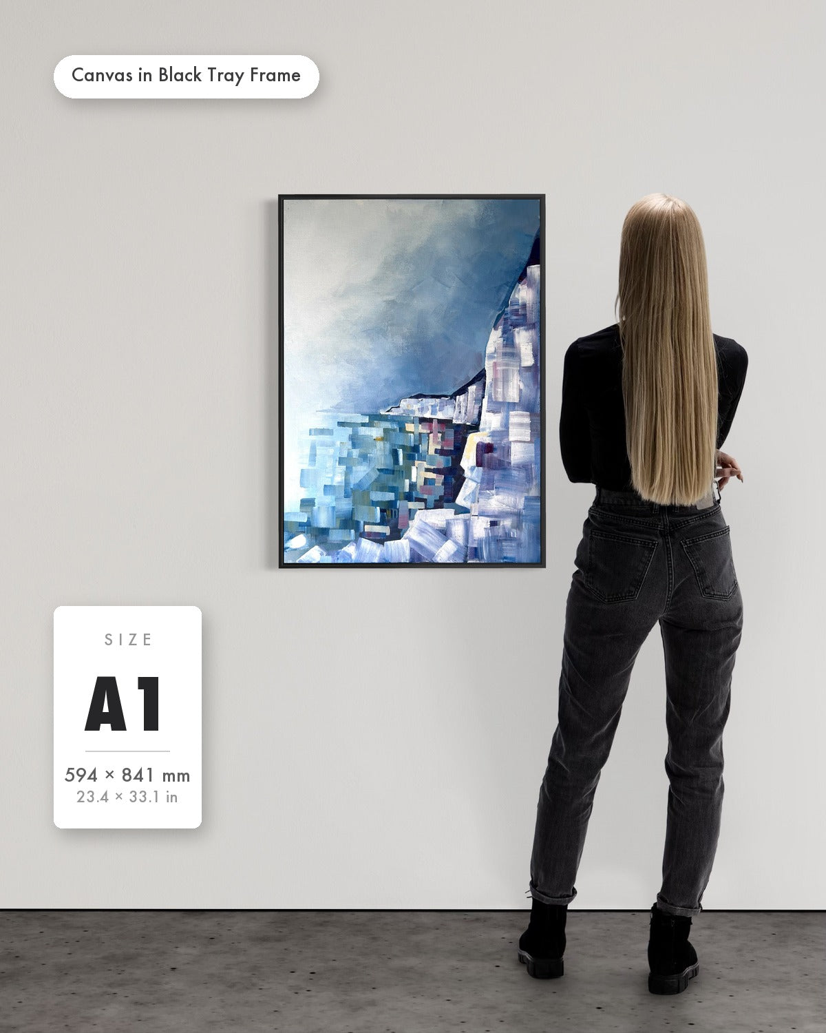Andrea Nicole 'Solitude' fine art canvas in a black tray float frame, A1 — shown to scale on a gallery wall with a size guide card. | an:family=canvas;role=sizeref;size=A1;finish=black