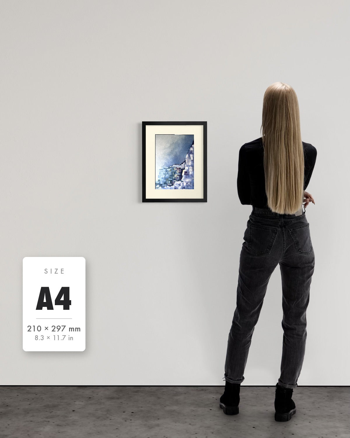 Solitude — A4 (210 x 297 mm) black frame art print shown to scale beside a person, with a size guide card. | an:family=print;role=sizeref;size=A4;finish=black