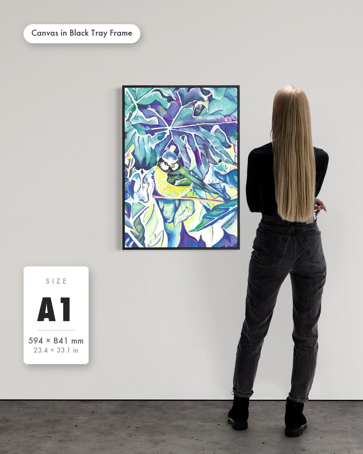 Andrea Nicole 'Taking Flight' fine art canvas in a black tray float frame, A1 — shown to scale on a gallery wall with a size guide card. | an:family=canvas;role=sizeref;size=A1;finish=black