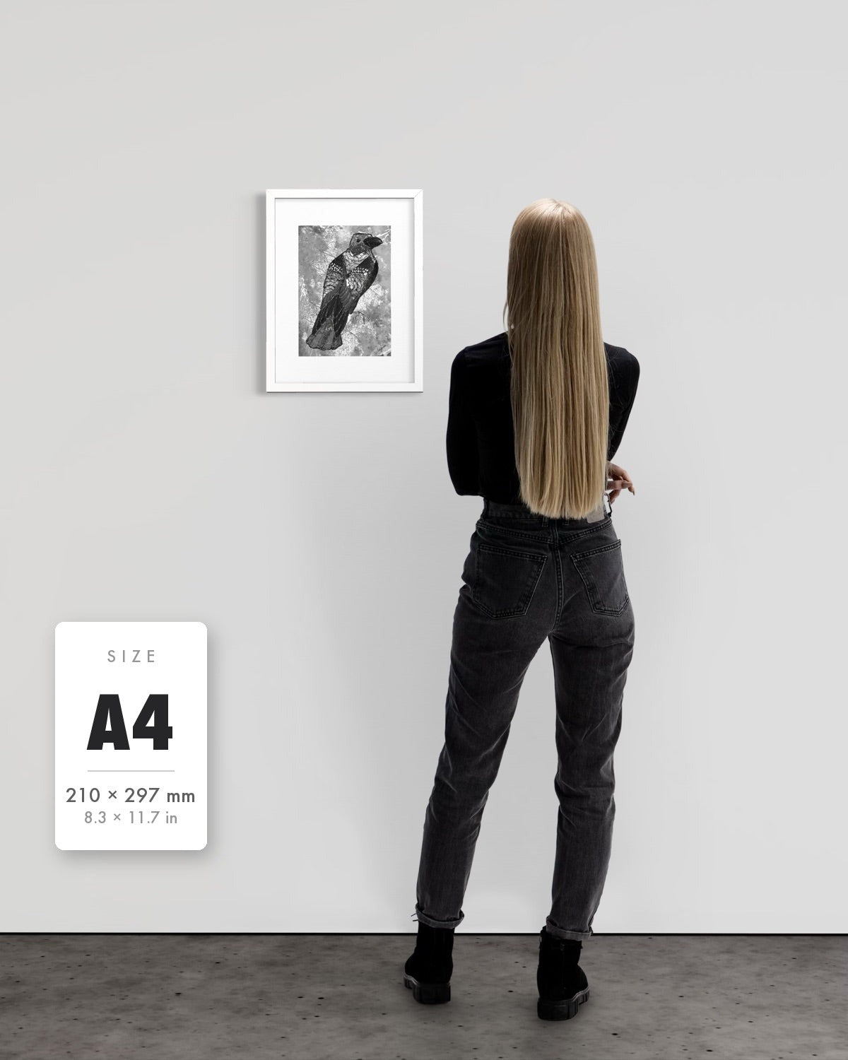 The Journey to Transformation — A4 (210 x 297 mm) white frame art print shown to scale beside a person, with a size guide card. | an:family=print;role=sizeref;size=A4;finish=white