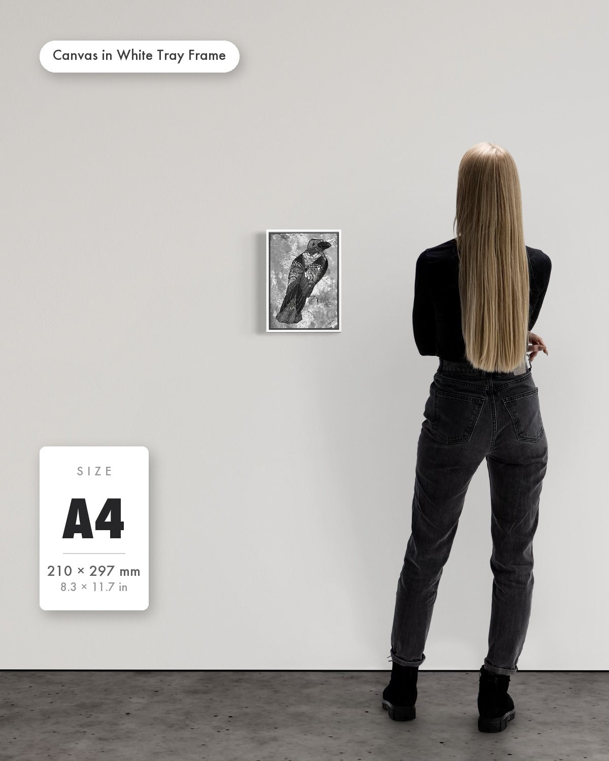 Andrea Nicole 'The Journey to Transformation' fine art canvas in a white tray float frame, A4 — shown to scale on a gallery wall with a size guide card. | an:family=canvas;role=sizeref;size=A4;finish=white