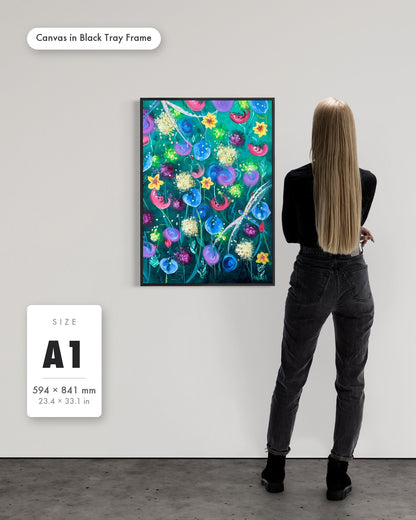 Andrea Nicole 'Things Still Bloomed' fine art canvas in a black tray float frame, A1 — shown to scale on a gallery wall with a size guide card. | an:family=canvas;role=sizeref;size=A1;finish=black