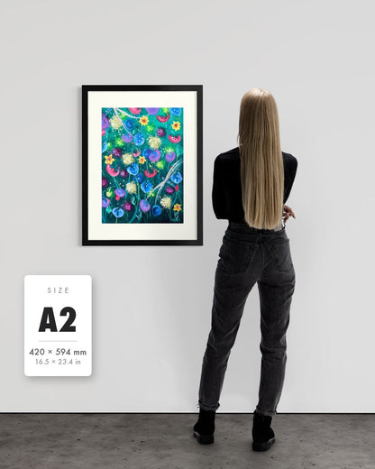 Things Still Bloomed — A2 (420 x 594 mm) black frame art print shown to scale beside a person, with a size guide card. | an:family=print;role=sizeref;size=A2;finish=black