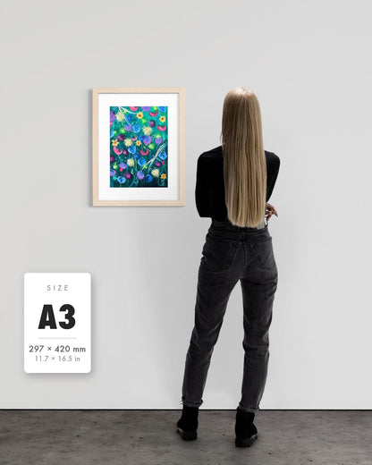 Things Still Bloomed — A3 (297 x 420 mm) natural frame art print shown to scale beside a person, with a size guide card. | an:family=print;role=sizeref;size=A3;finish=natural