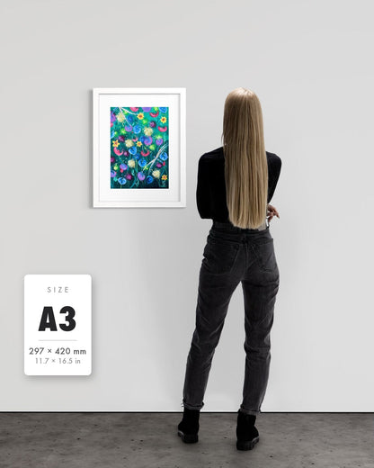Things Still Bloomed — A3 (297 x 420 mm) white frame art print shown to scale beside a person, with a size guide card. | an:family=print;role=sizeref;size=A3;finish=white