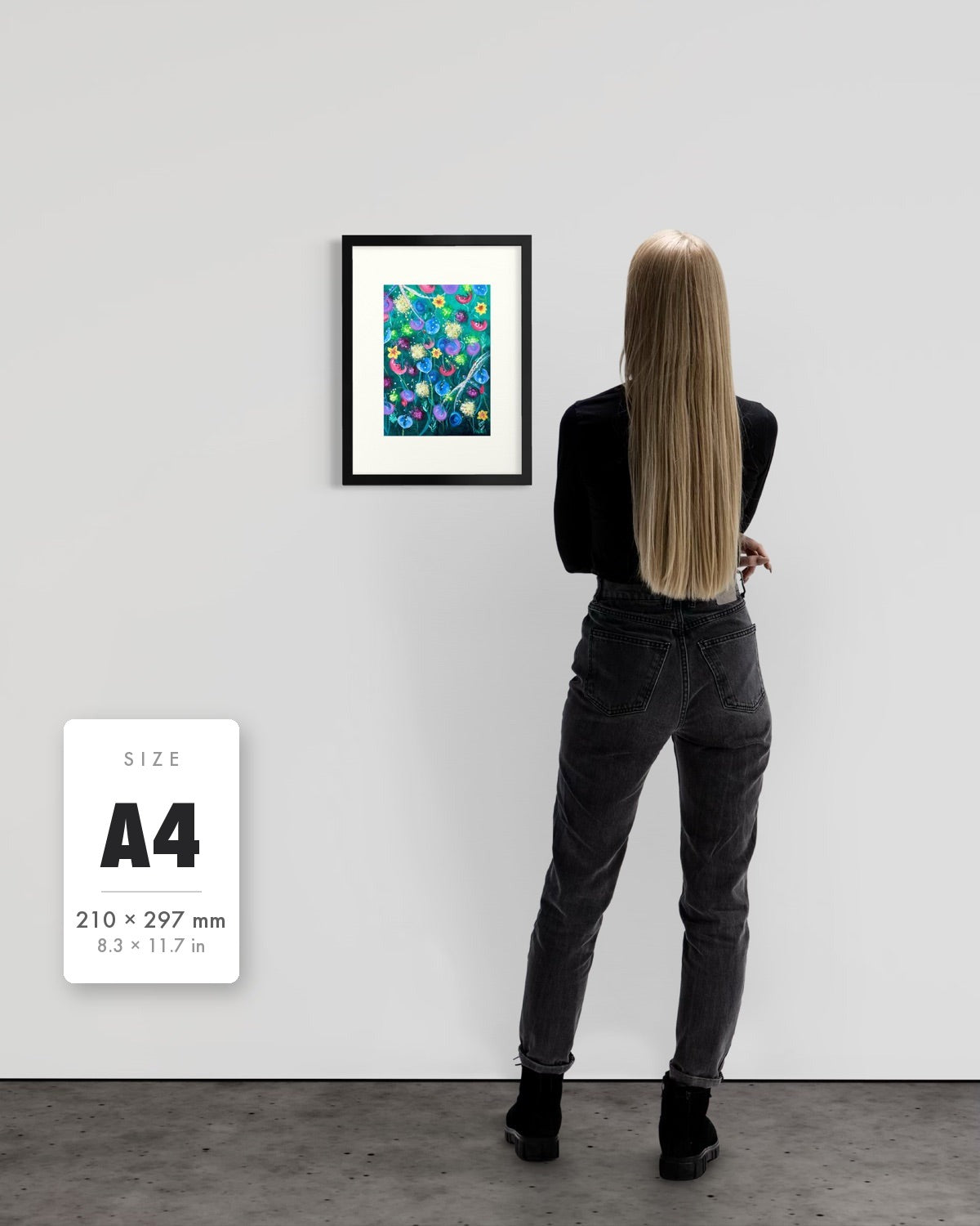 Things Still Bloomed — A4 (210 x 297 mm) black frame art print shown to scale beside a person, with a size guide card. | an:family=print;role=sizeref;size=A4;finish=black