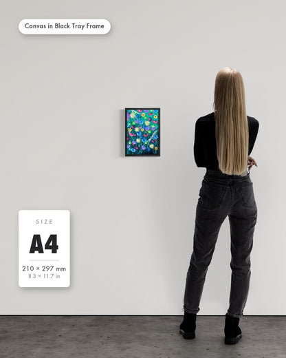 Andrea Nicole 'Things Still Bloomed' fine art canvas in a black tray float frame, A4 — shown to scale on a gallery wall with a size guide card. | an:family=canvas;role=sizeref;size=A4;finish=black