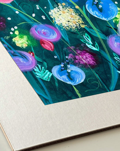 Andrea Nicole 'Things Still Bloomed' giclée fine art print in an off-white window mount, shown corner-on so the bevel-cut window opening, 100% cotton paper and mount board are visible. | an:family=print;role=mount