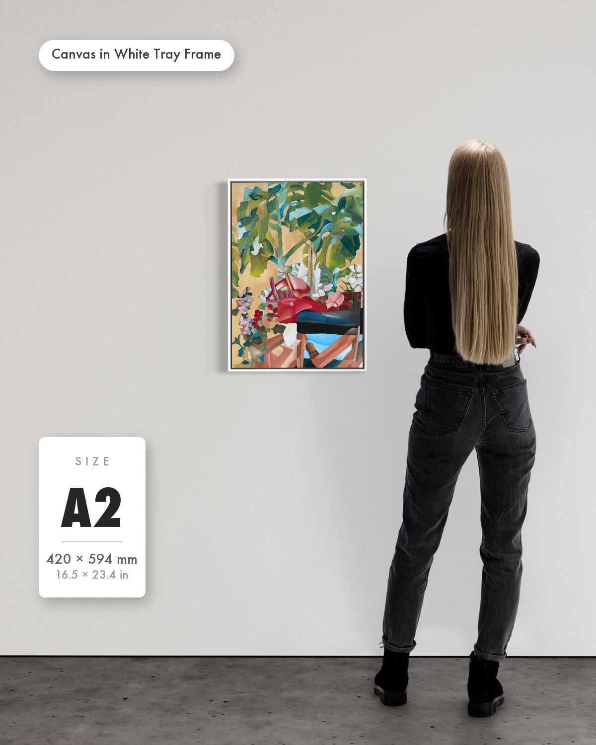 Andrea Nicole 'Waiting For Me' fine art canvas in a white tray float frame, A2 — shown to scale on a gallery wall with a size guide card. | an:family=canvas;role=sizeref;size=A2;finish=white